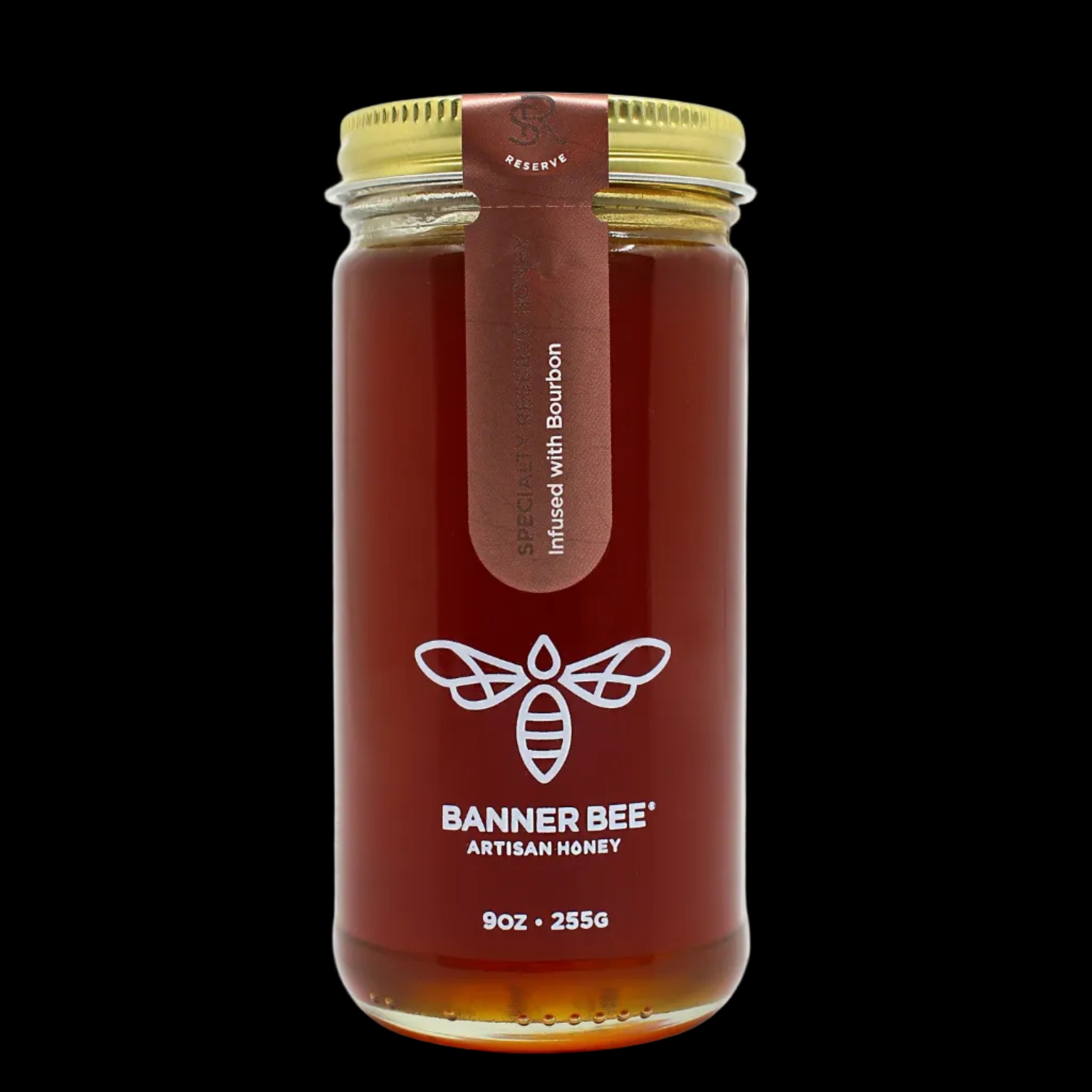 Jar of Banner Bee Artisan Honey with a gold lid on a white background
